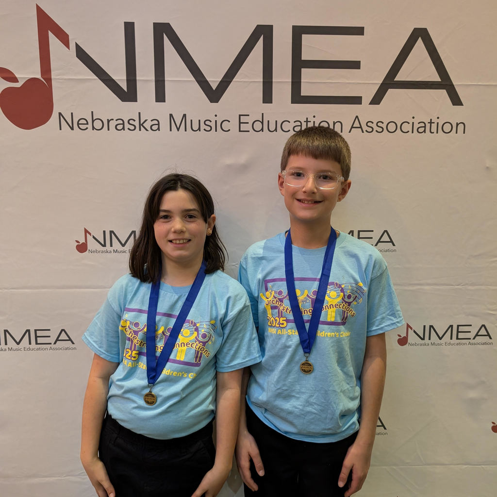 Jordyn Leisy and James Wolgemuth after the All State Children's Choir performance held on the Lied Center Stage in Lincoln, NE at the NMEA Conference.