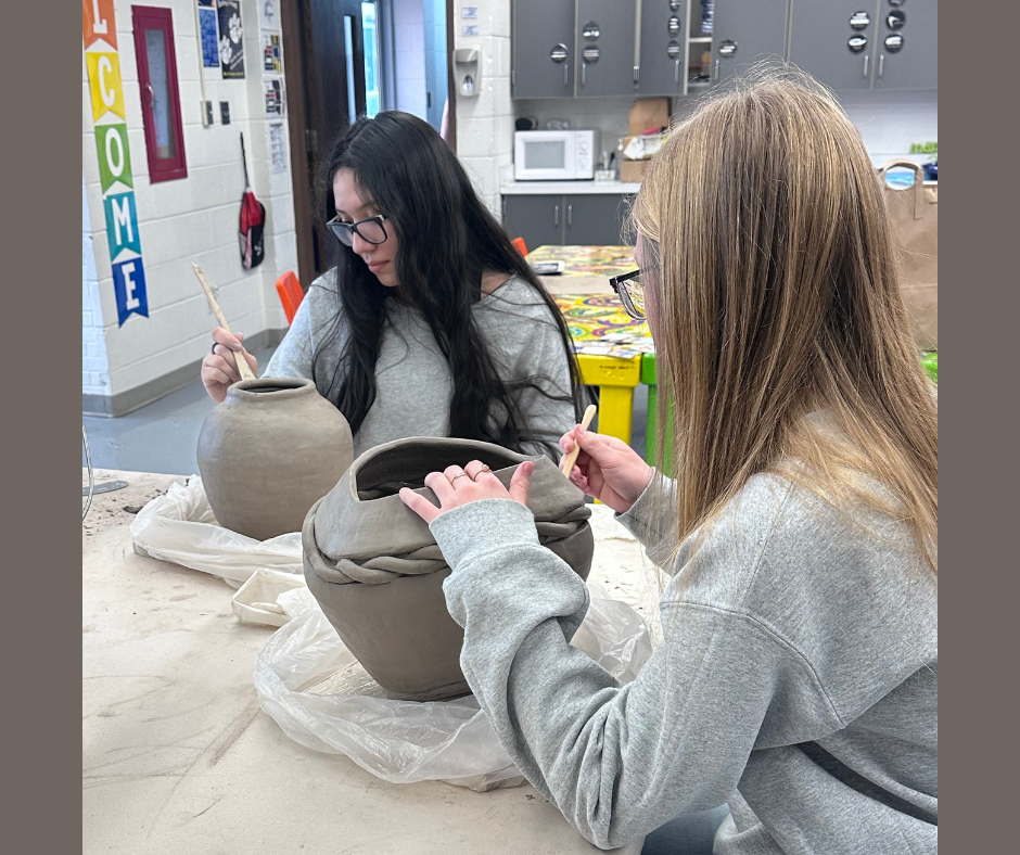 Valeria and Jadyn working on their pottery