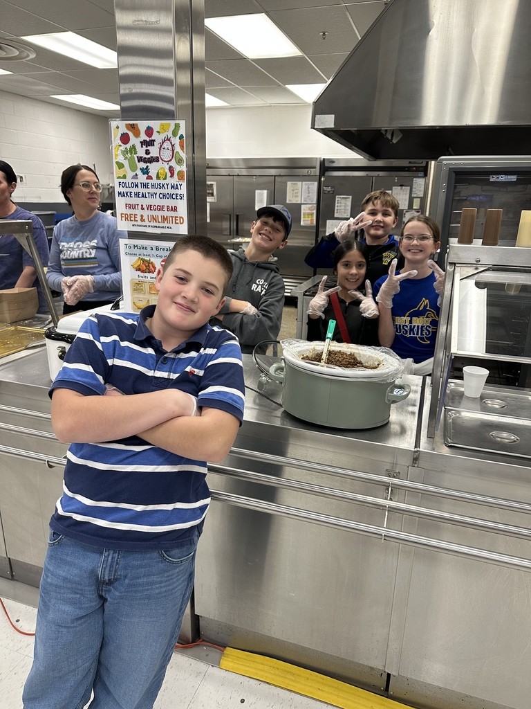 students serving potatoes