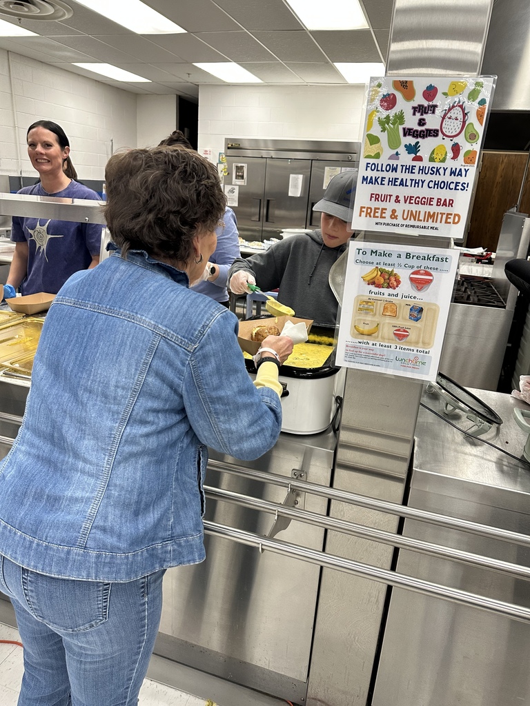 students serving potatoes