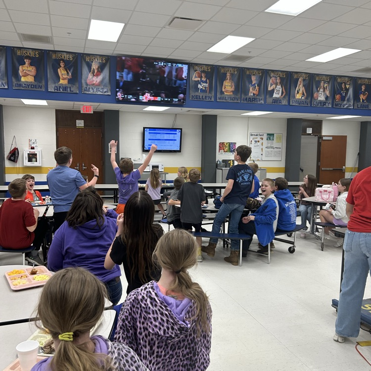 students watching Husker basketball 