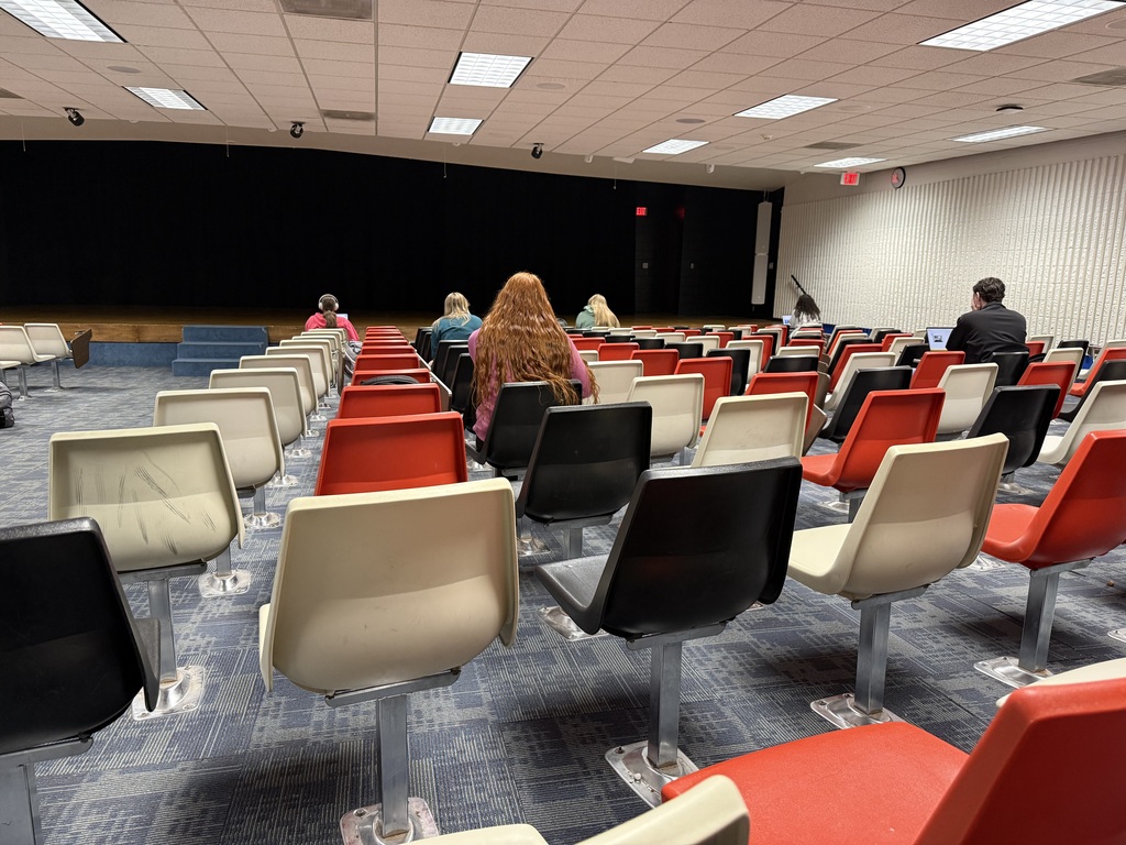 Students spread out so they have ample space for their audio.