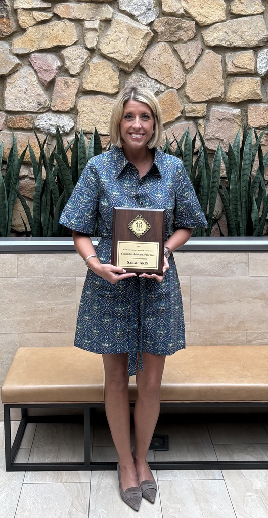 sarah akin receiving an award