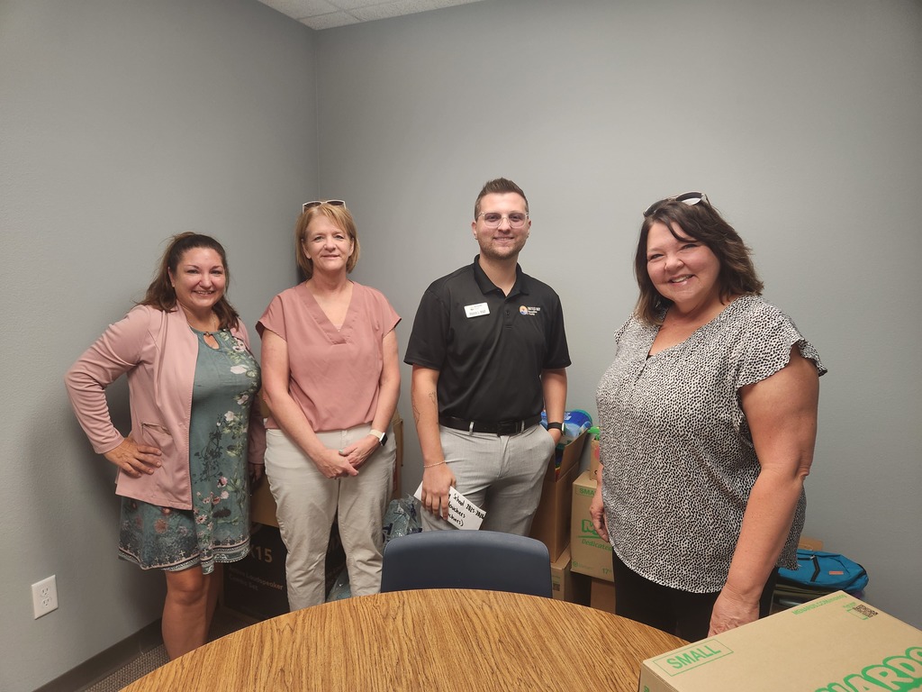 West Liberty Foods and United Way representatives drop off school supplies