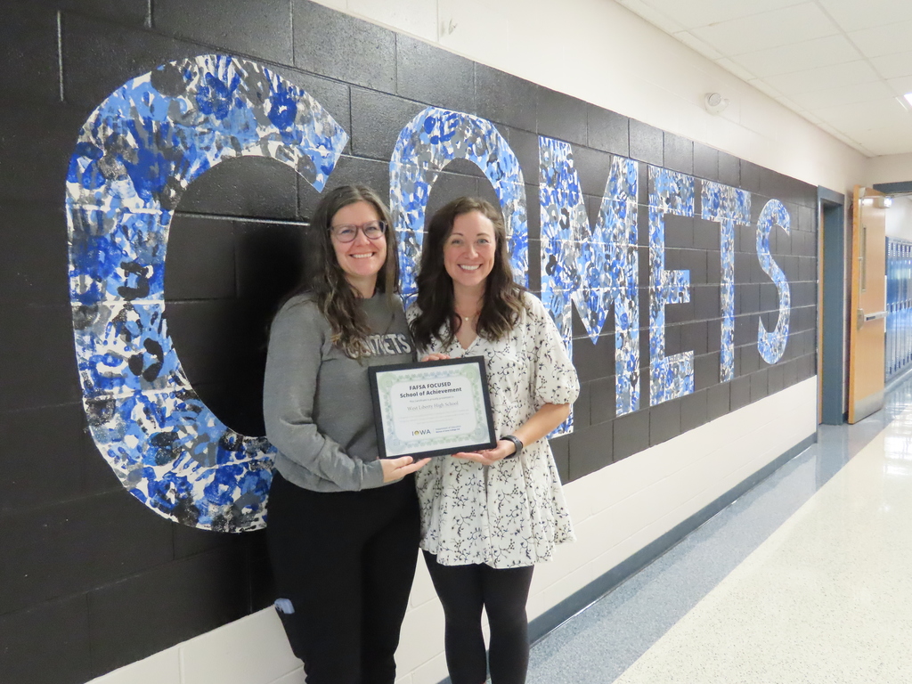 Counselors Ramsey and Shultice holding the FAFSA Focused School of Achievement