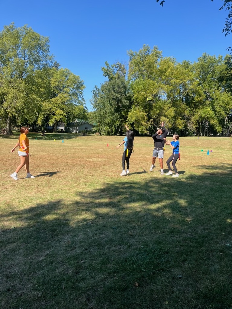 8th graders 2 v 2 flag football! They are working on positions of quarterback and receiver to have 4 downs to score a touchdown.