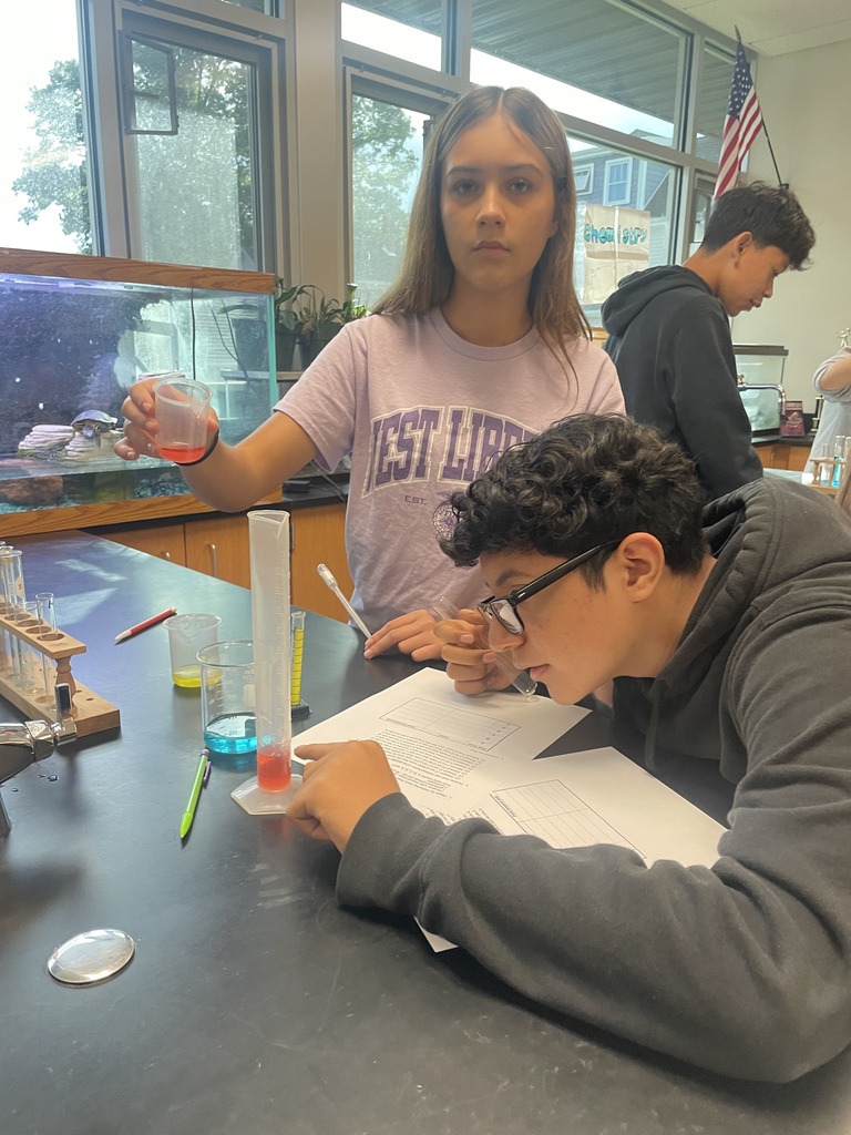 8th graders working on following procedures and making accurate measurements in science!