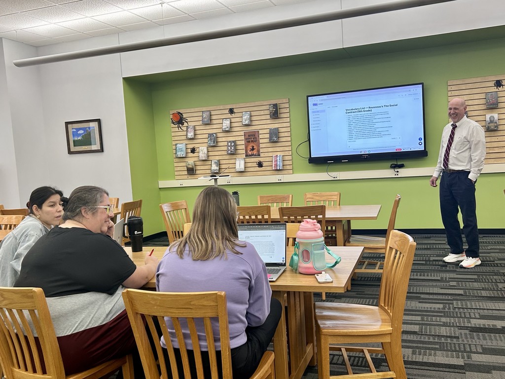 Assistant Principal Weidenaar presents to a group of High School teachers