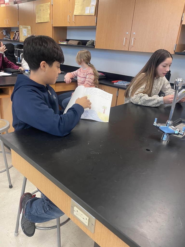 8th grade science students enjoyed reading their "I Am A Water Molecule" books to 5th and 6th graders this week!