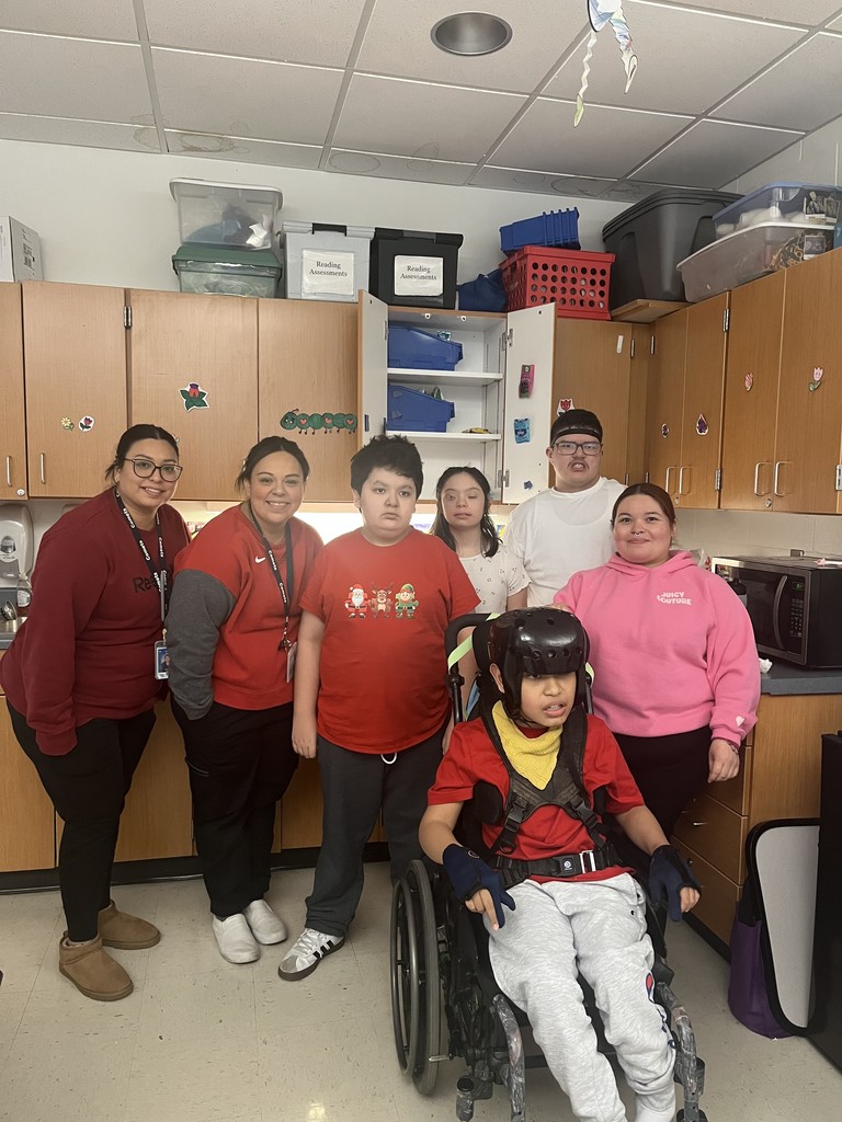 Wearing pink, red, and white at the middle school to kick off a short week!