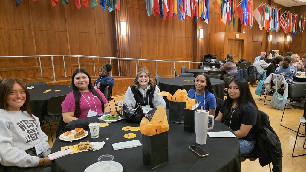 WLHS Educators Rising Members seated at their table for the 3rd annual state conference at the University of Iowa