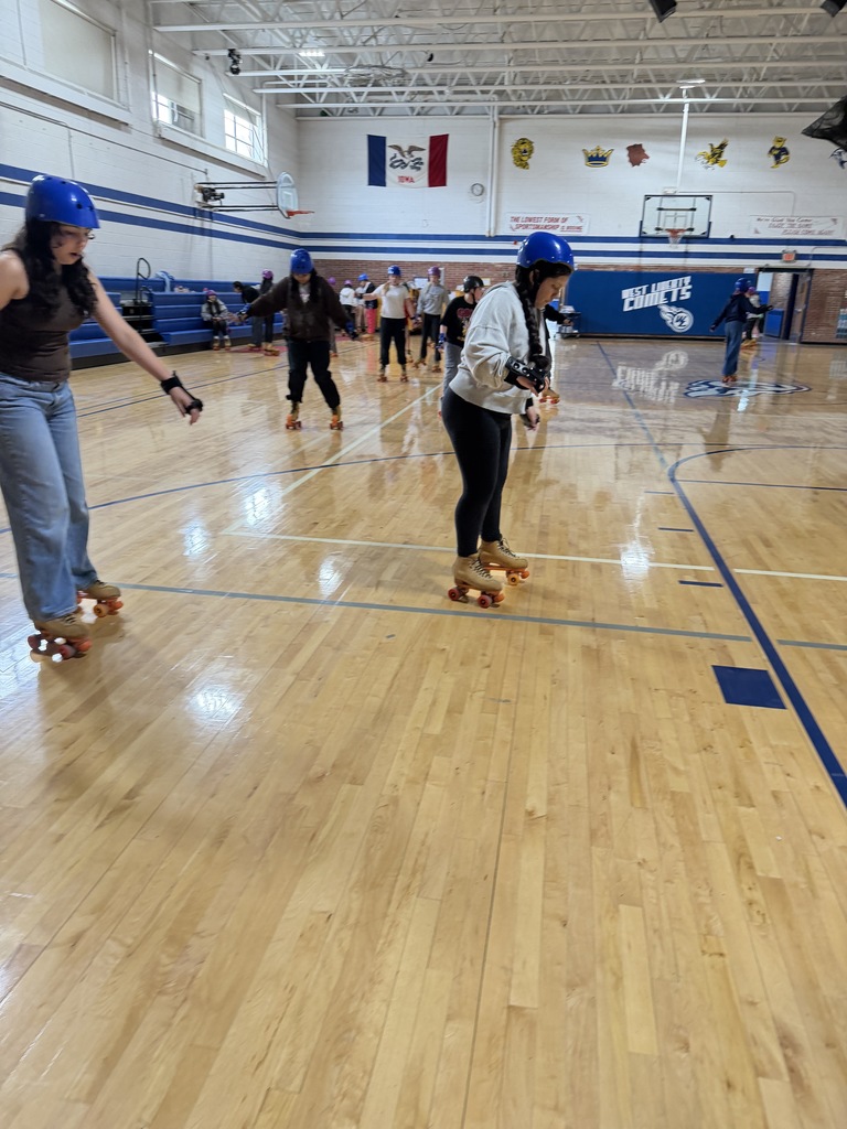 Middle School students are having a GREAT time rollerskating!!