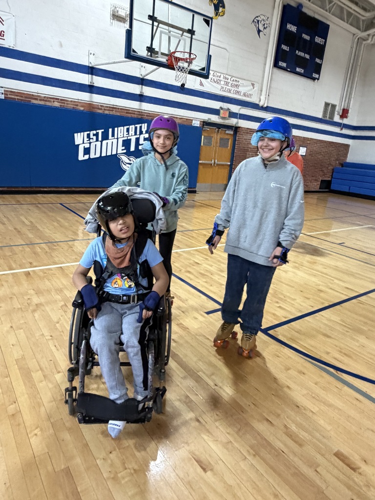 Middle School students are having a GREAT time rollerskating!!