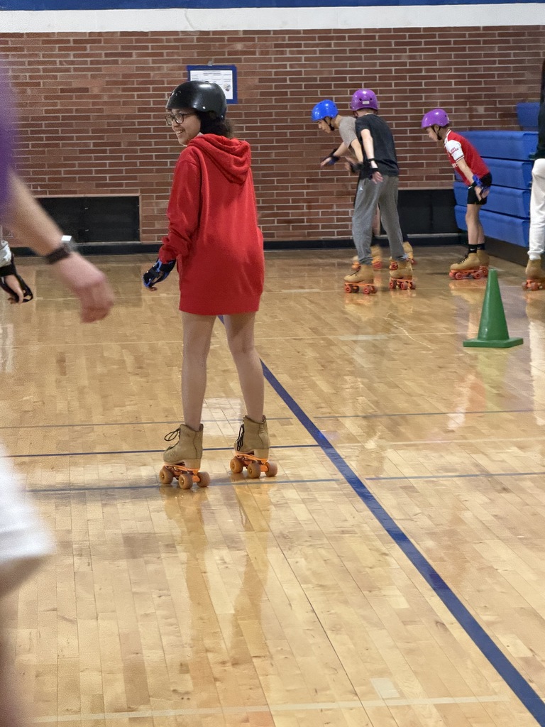 Middle School students are having a GREAT time rollerskating!!