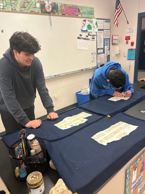 Signing the 2026 Ag Biotechnology State Champion Banner