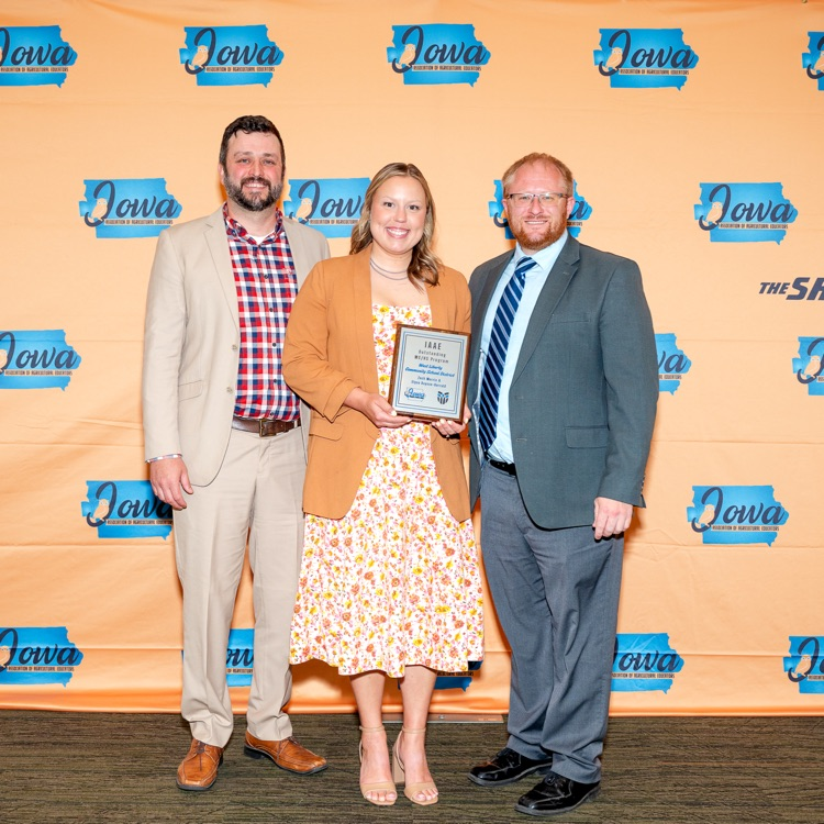 Elyse Buysse-Herrold and Zach Morris receive IAAE Outstanding MS/HS Program 2026 