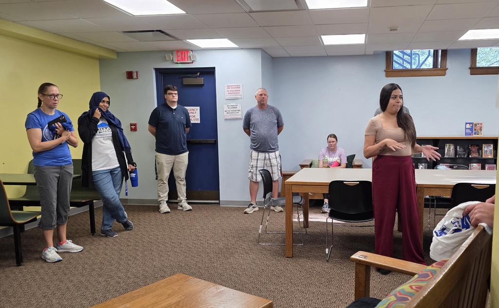 High School Teachers Tour Public Library