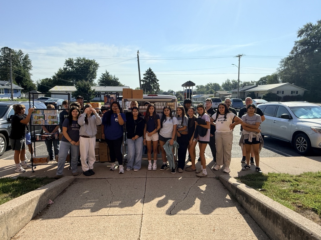 Sept 2nd 2026 Middle School volunteers unload Backpack Program food items