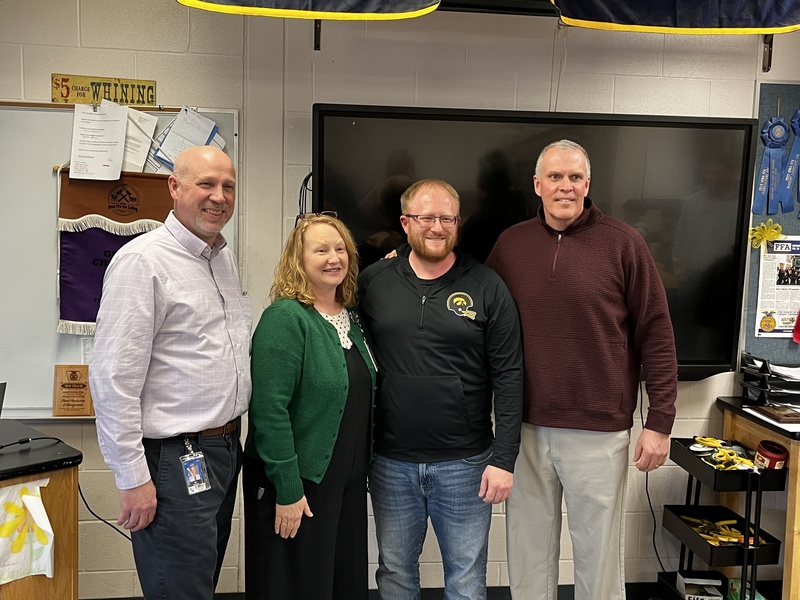 Assistant Principal Weidenaar, Principal Arthur-Miller, Mr. Morris, and Superintendent Kruger