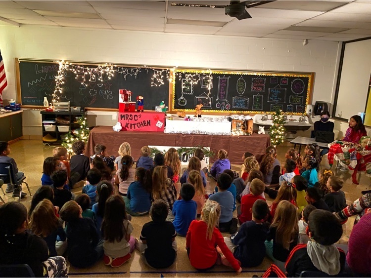 ELC students watching the puppet show