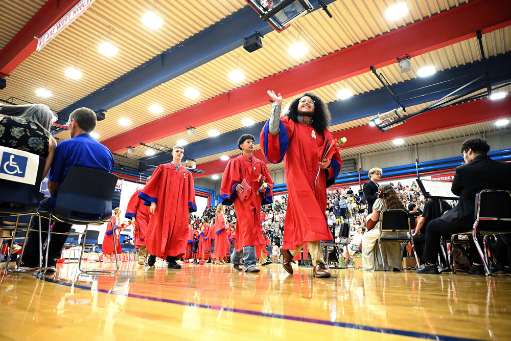 kids walking at a graduation ceremony
