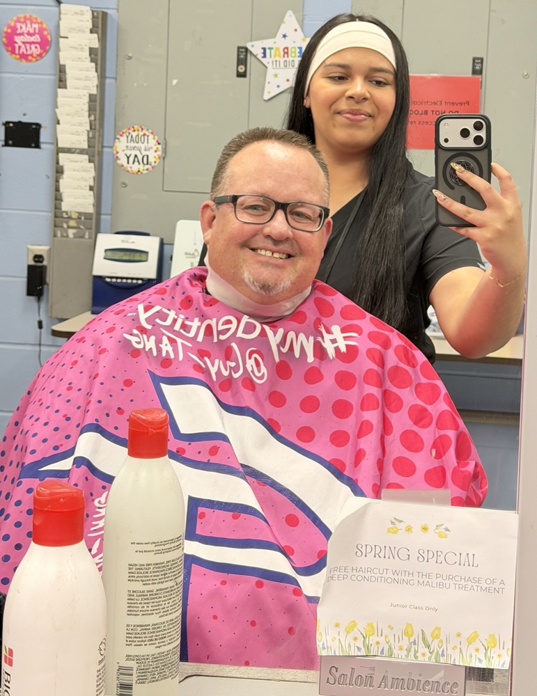 melissa ledesma and mike deak in the chair at fairfield cosmetology