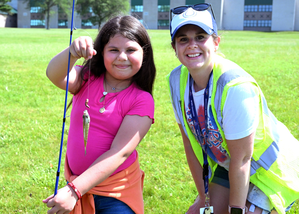 two people fishing at west noble middle school