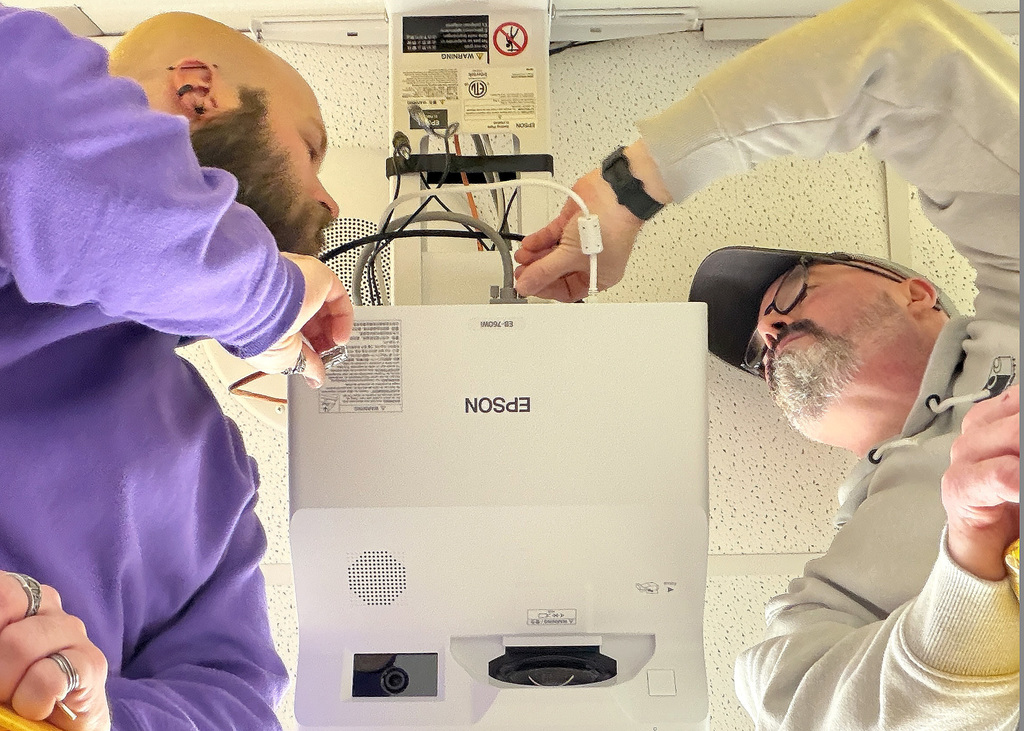 Jared and Doug working on a projector