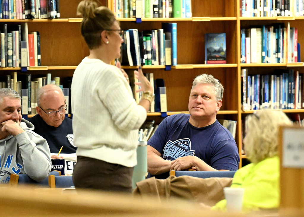 Monte listening to a presentation