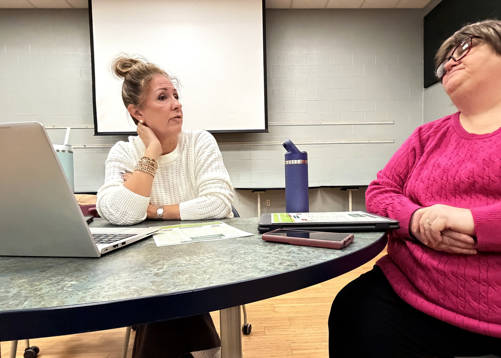 Carrie Hoffman and Amy Schroeder talking