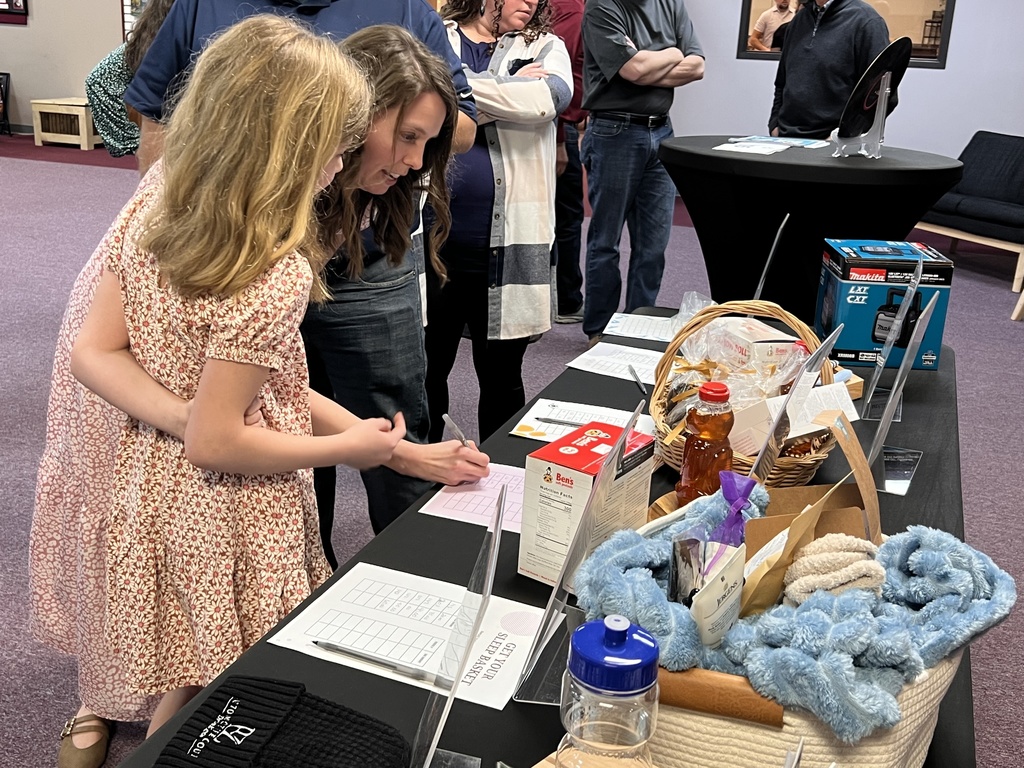 silent auction goers at night of hope
