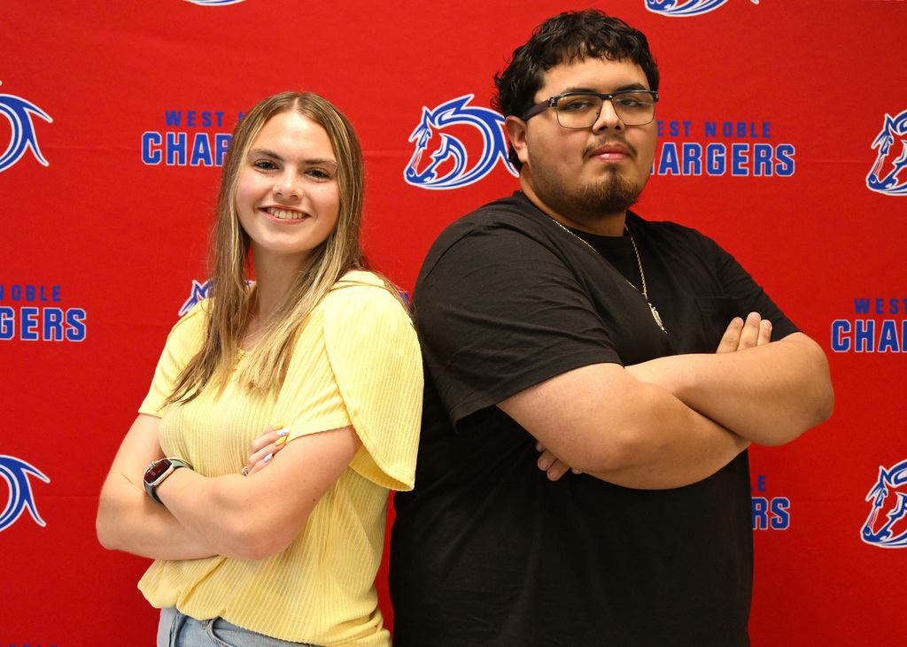 two people posing for a picture