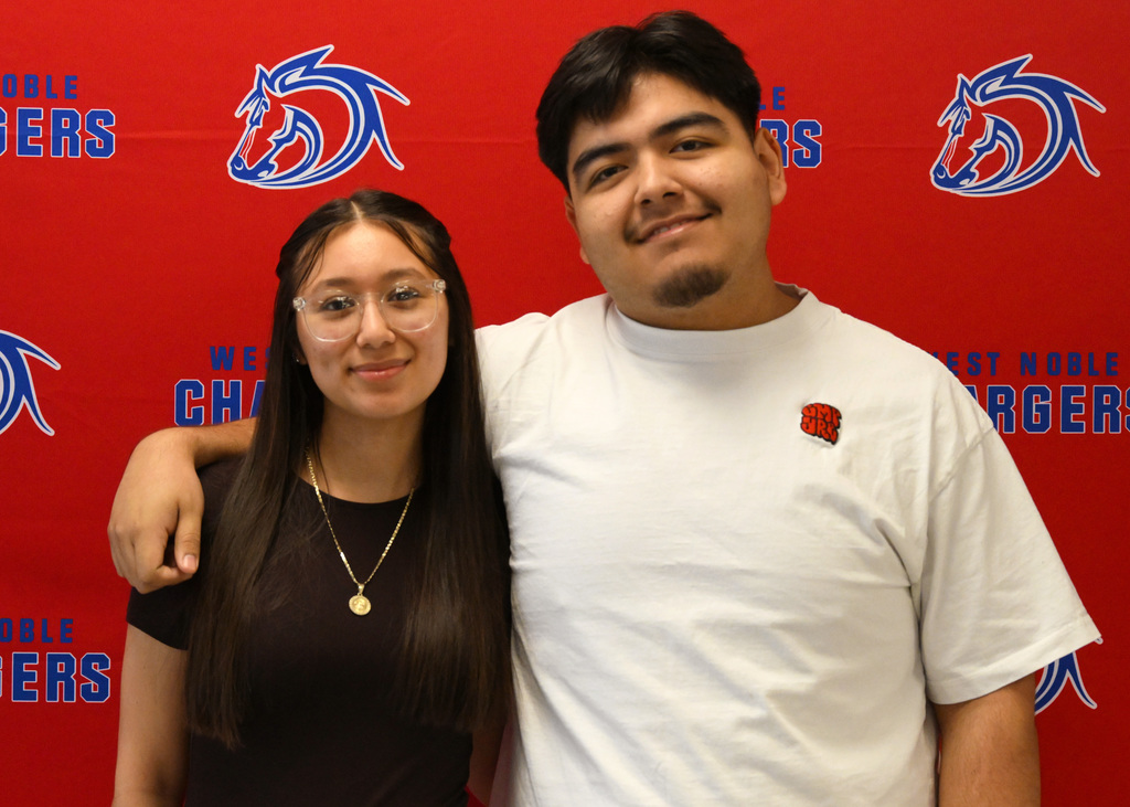 two people posing for a picture
