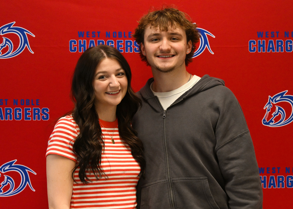 two people posing for a picture