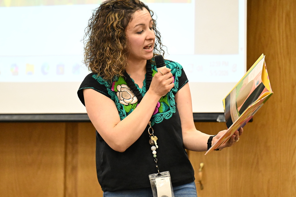 grisel campos reading a book