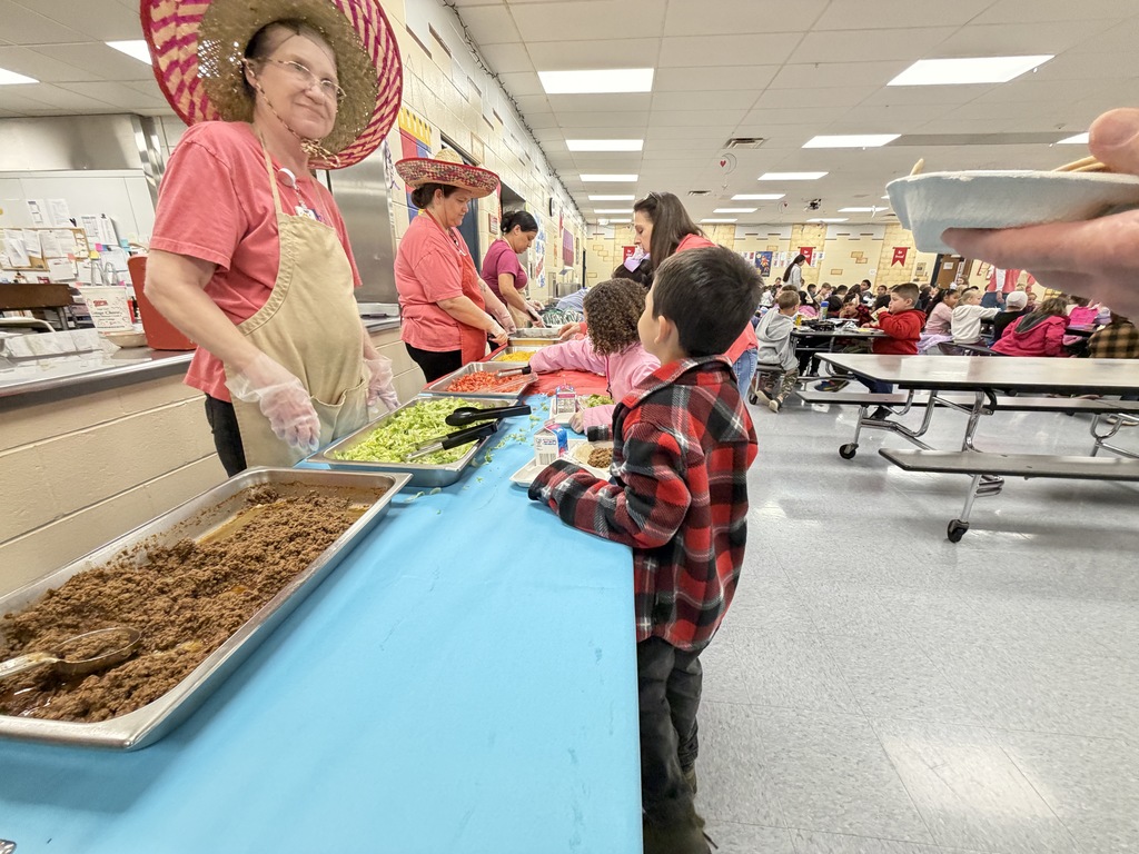 tacos being served in the lunchline