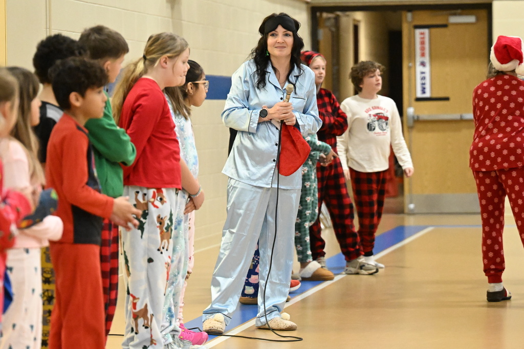 teacher in a gym with students