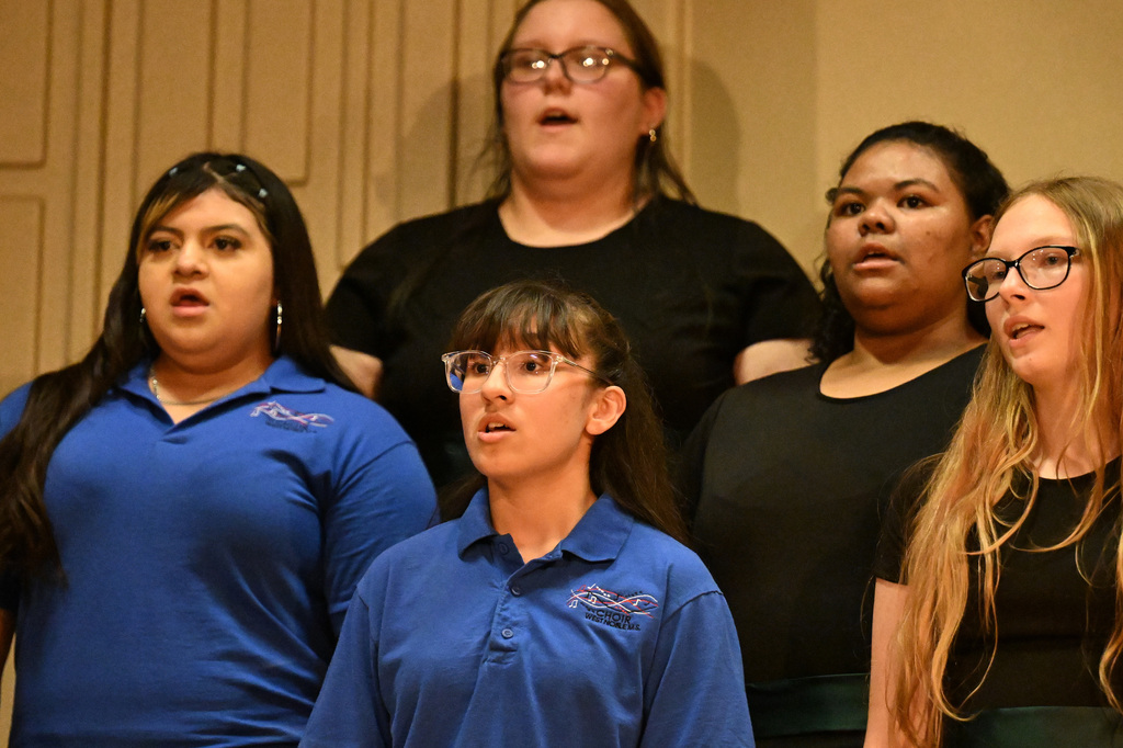 girls singing at a choir concert