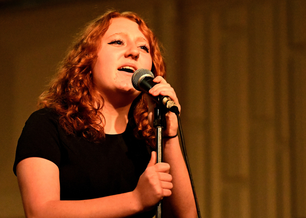 girls singing at a choir concert