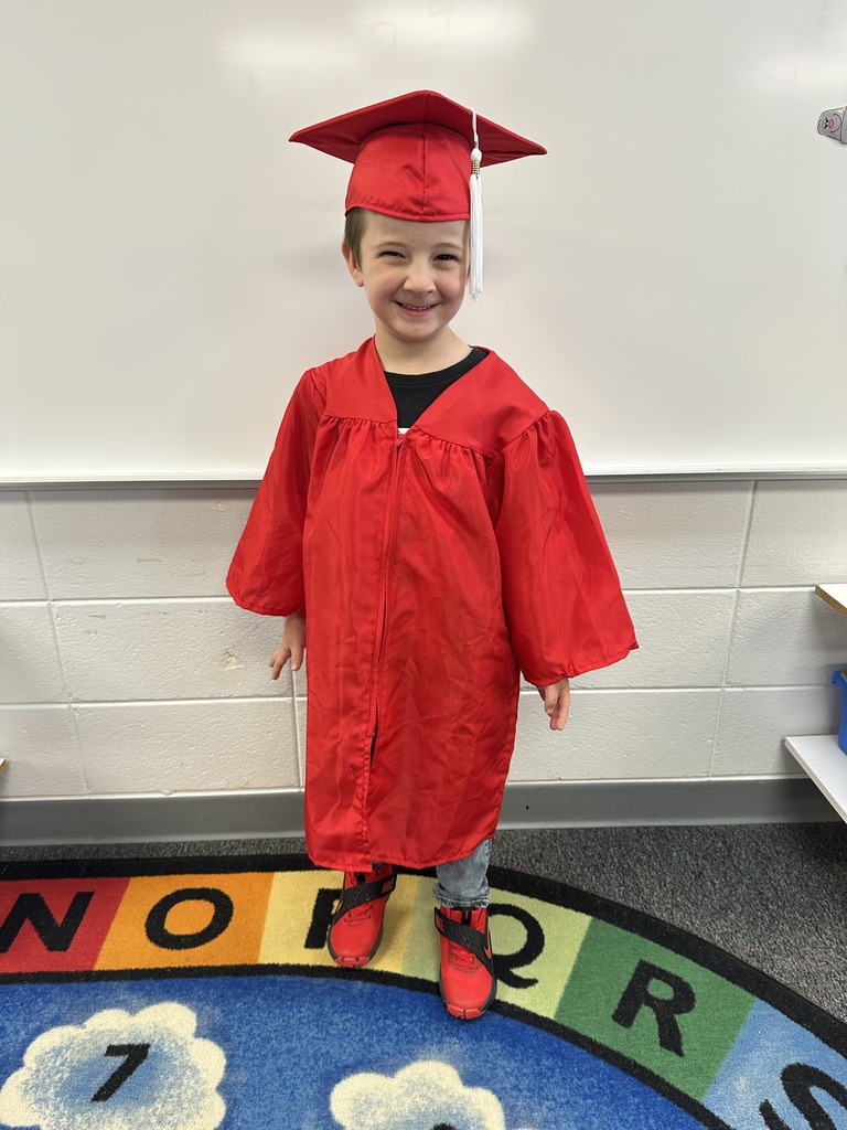 a little kid at a graduation ceremony