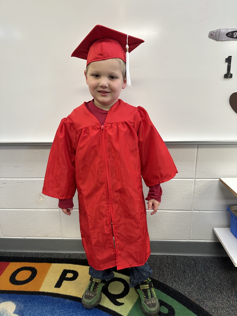 a little kid at a graduation ceremony