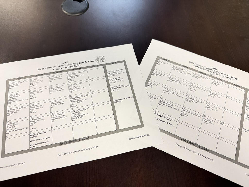 two school menus on a table