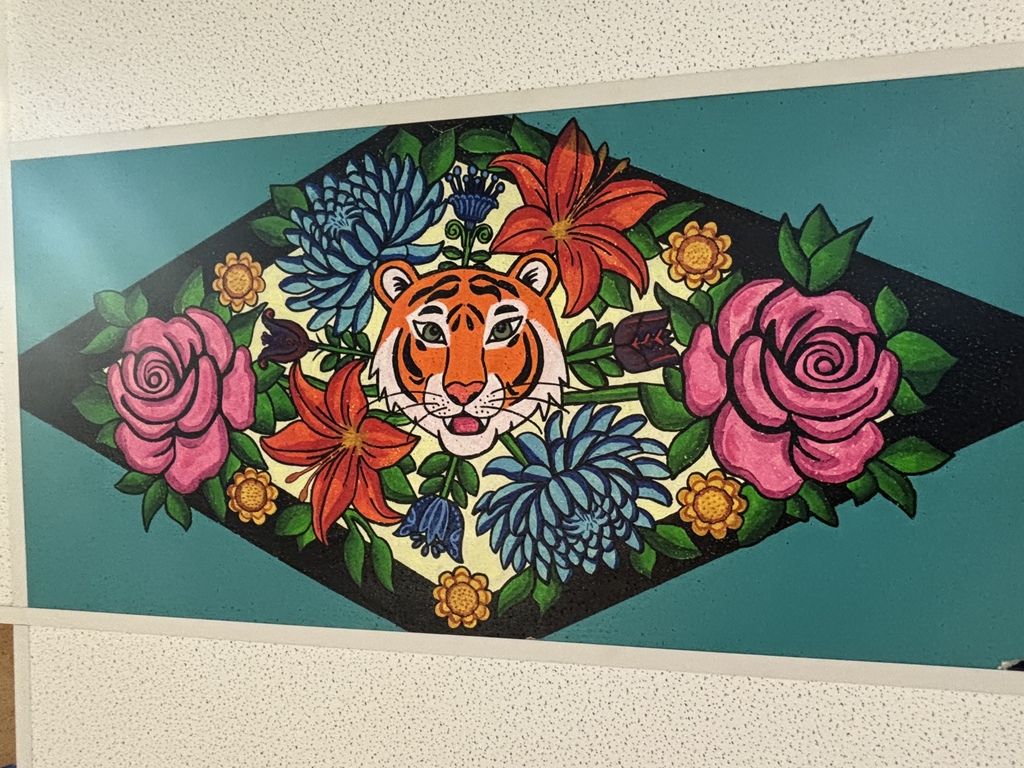 tigers and flowers painted on a ceiling tile