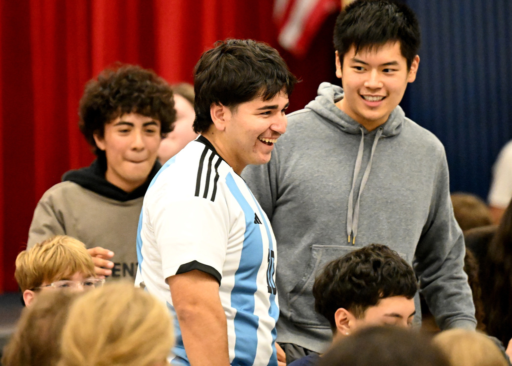 three boys laughing