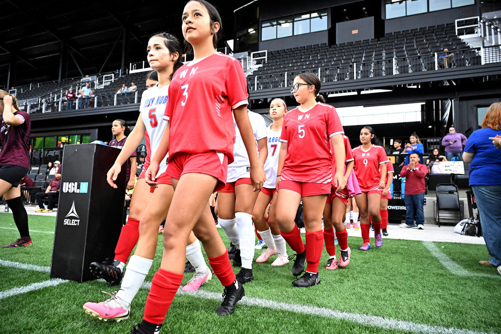 girls playing soccer