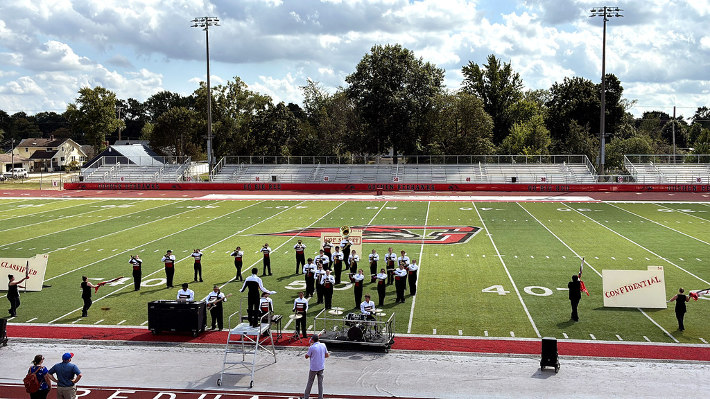 a band playing on a football field