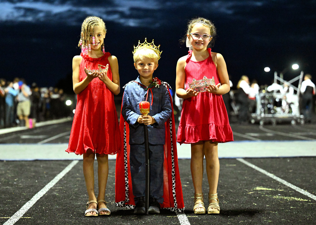 two people posing for homecoming