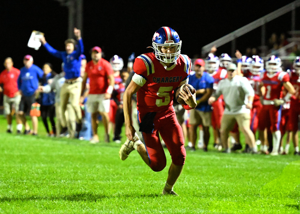 a football player running with the ball