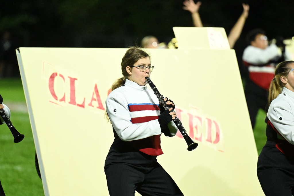 someone playing an instrument in a marching band