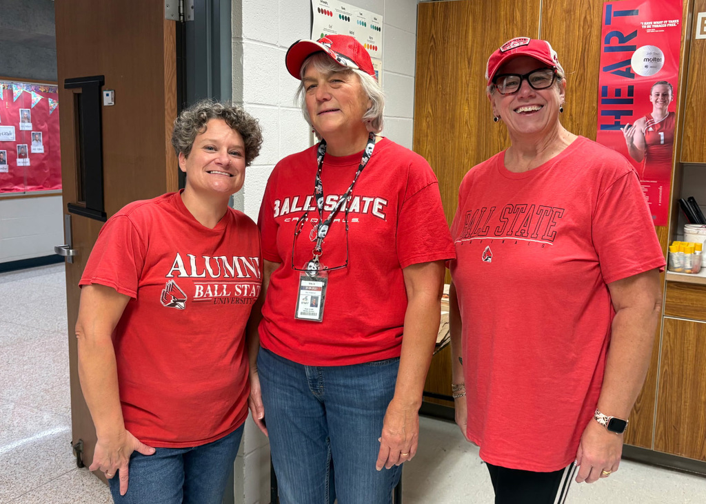 three women wearing ball state tshirts, two are in hats